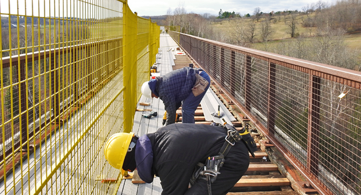 doubes trestle bridge renovation workers
